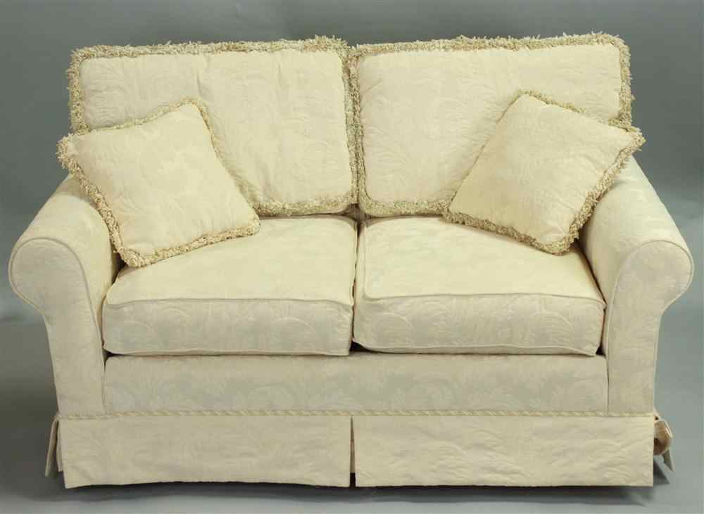 Appraisal: WHITE DAMASK UPHOLSTERED LOVESEAT having an upholstered back with double