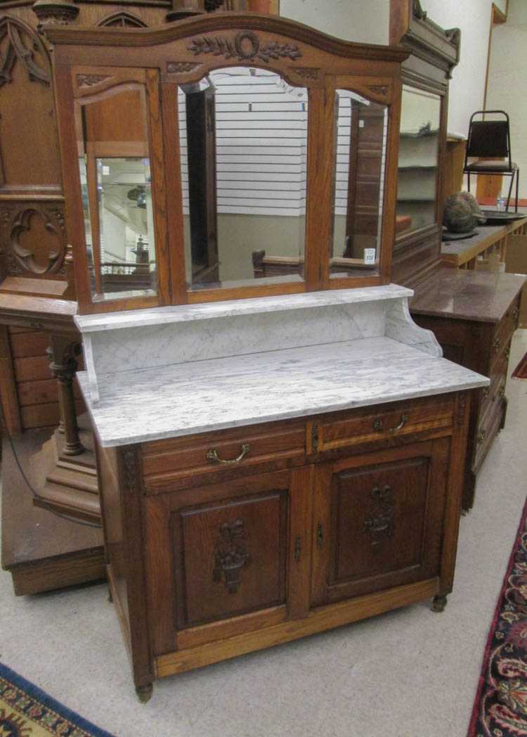 Appraisal: LOUIS XVI STYLE OAK MARBLE-TOP DRESSER WITH MIRROR Continental late