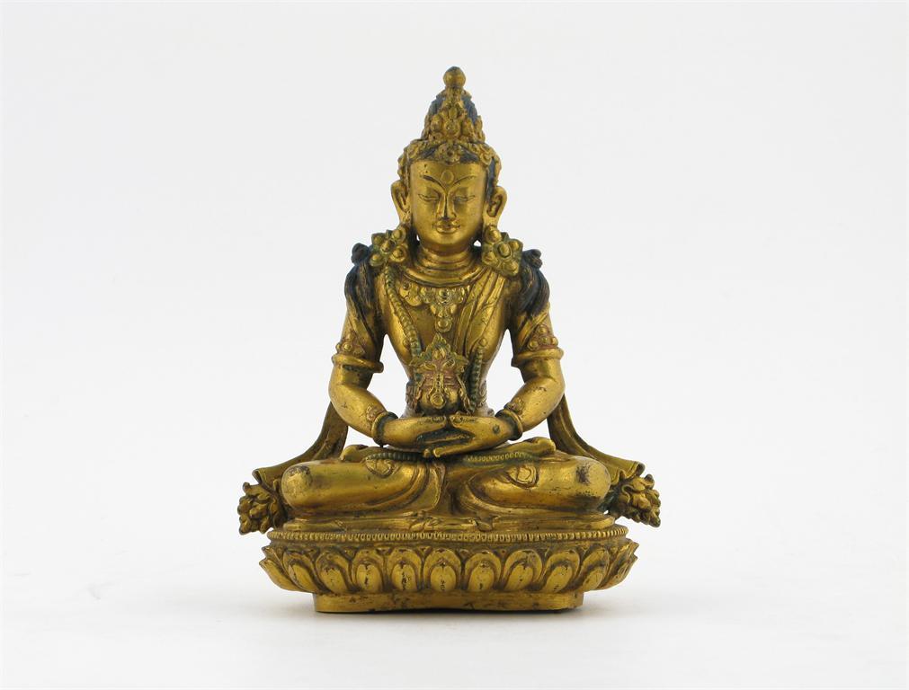 Appraisal: A Tibetan gilt bronze figure of Amitayus