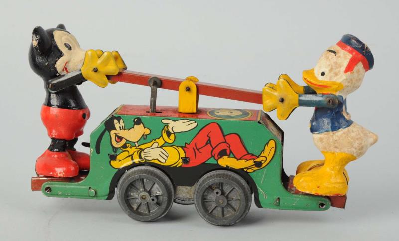 Appraisal: Wells Walt Disney Mickey Donald Handcar Toy Tin litho wind-up