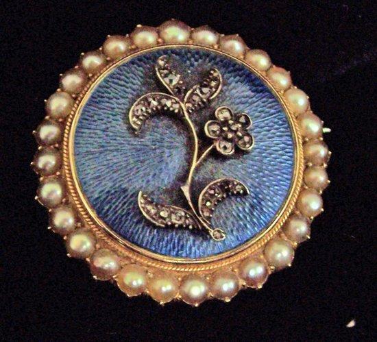 Appraisal: A Victorian enamel diamond and pearl brooch