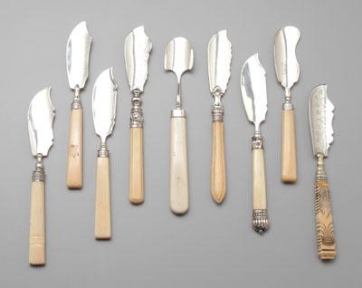 Appraisal: English silver cheese knives all with ivory handles several carved