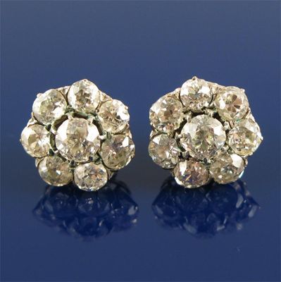 Appraisal: A pair of diamond cluster ear studs Each stud set