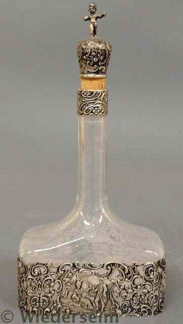 Appraisal: Continental etched glass decanter with silver overlay neck ring and