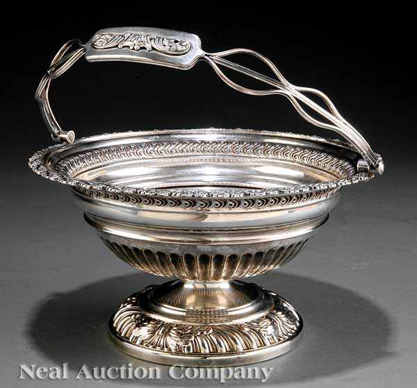 Appraisal: An Antique English Silverplate Cake Basket th c circular footed