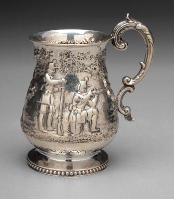 Appraisal: English silver mug baluster form with repousse military and forest