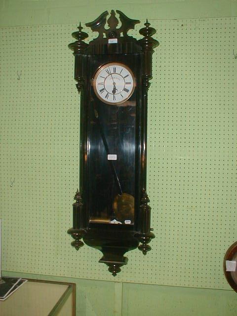 Appraisal: A late thC ebonised Vienna type wall clock with two