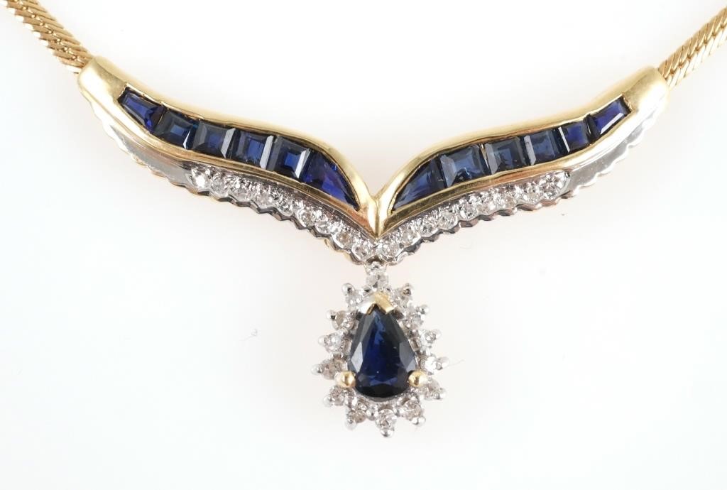 Appraisal: K yellow gold diamond and sapphire necklace Chain is K