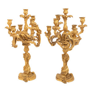 Appraisal: A Pair of Louis XV Style Gilt Bronze Seven-Light Candelabra