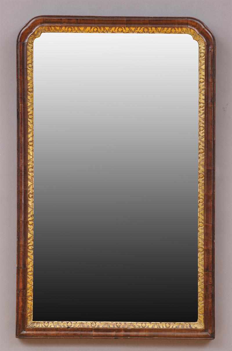 Appraisal: QUEEN ANNE WALNUT AND PARCEL-GILT RECTANGULAR MIRROR Provenance Ernest Treganowan