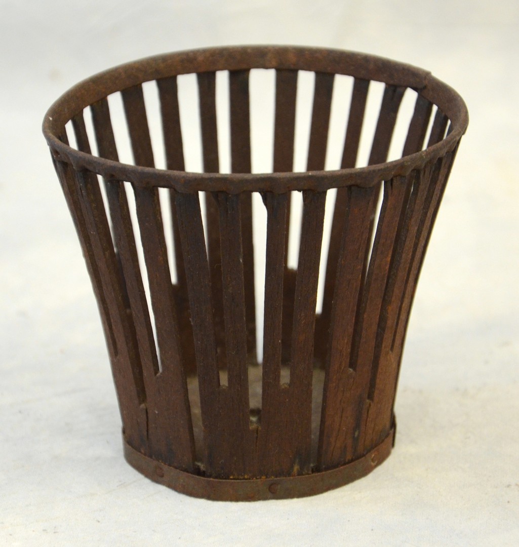 Appraisal: Shaker berry basket pierced sides metal rims wooden base nutty