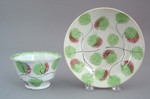 Appraisal: Spatter cup and saucer th c with clover decoration