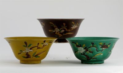 Appraisal: Three Chinese Brinjal bowls incised and painted with flowering prunus