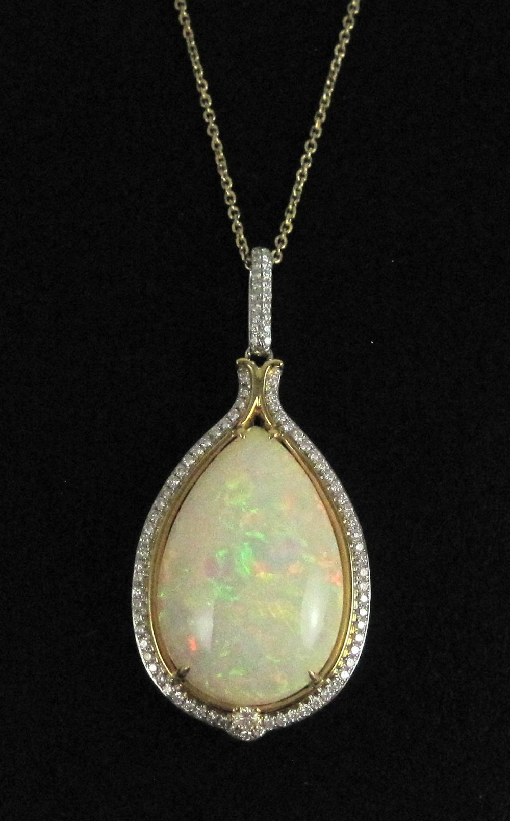 Appraisal: ETHIOPIAN OPAL AND DIAMOND PENDANT NECKLACE with an gold wash