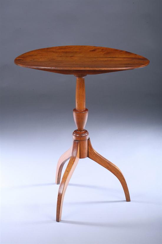 Appraisal: FEDERAL MIXED WOOD TILT-TOP TRIPOD CANDLESTAND early th century Oval