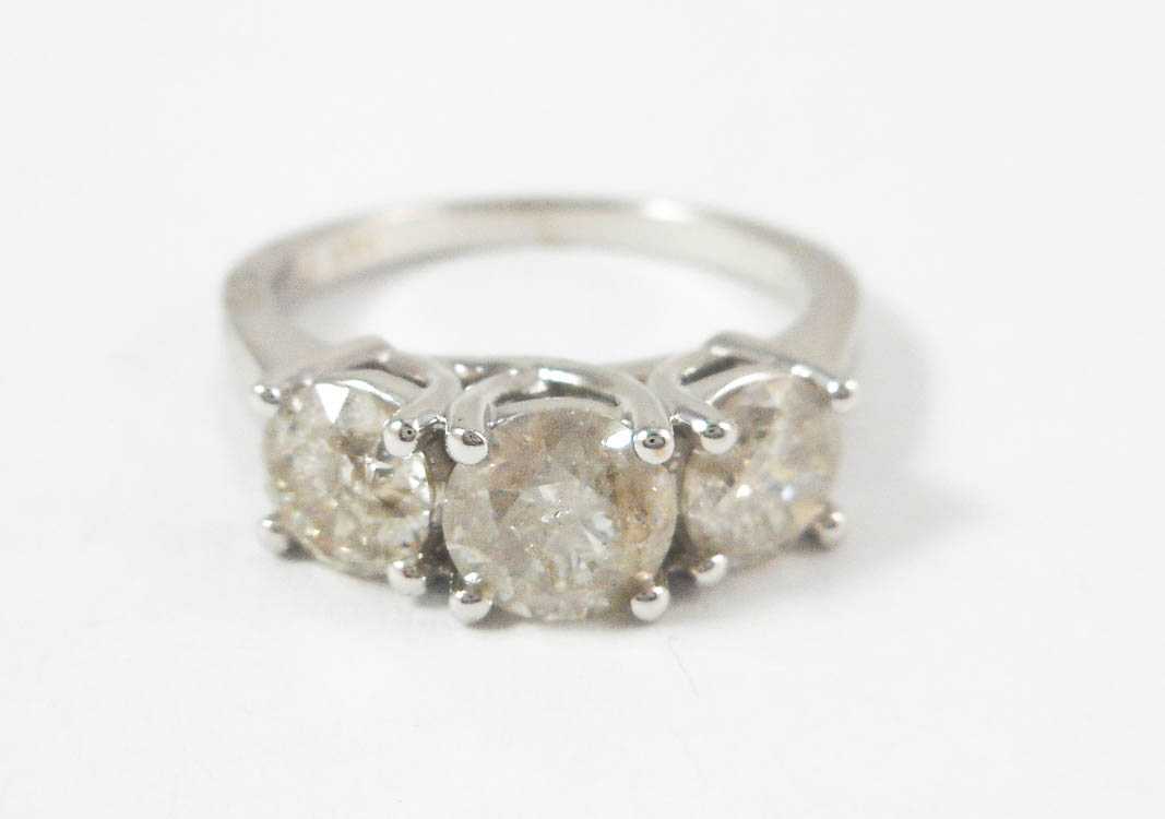 Appraisal: THREE STONE DIAMOND AND WHITE GOLD RING The k white