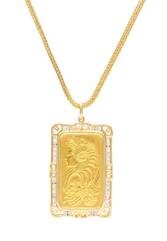 Appraisal: Sale Lot An Karat Yellow Gold and Diamond Pendant consisting