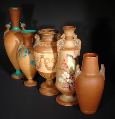 Appraisal: A Watcombe Torquay terracotta vase with applied lug handles highlighted