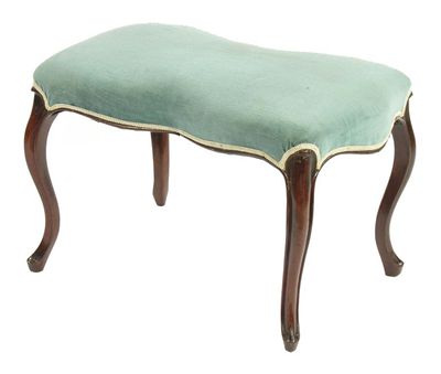 Appraisal: A mahogany footstool the serpentine edge upholstered top on cabriole