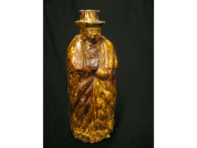 Appraisal: Early Bennington Rockingham Figural pottery flask of an old man