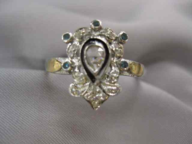 Appraisal: Diamond Ring pear shaped rose cut diamond surrounded by small