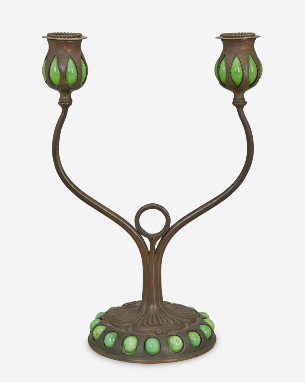 Appraisal: A Tiffany Studios double-arm bronze candlestick Circa - New York