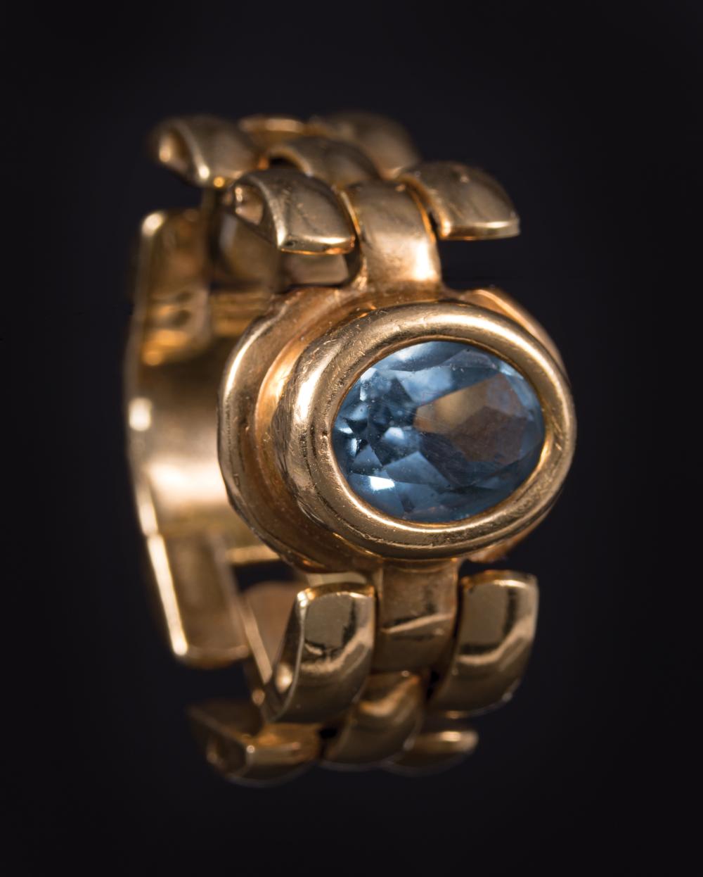 Appraisal: Yellow Gold and Aquamarine Ring unmarked with bezel set aquamarine