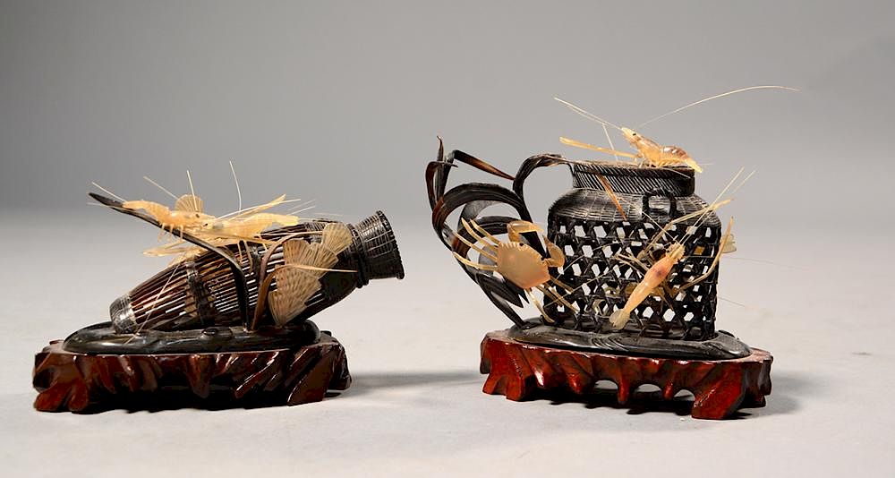 Appraisal: Pair of Japanese intricately carved fish traps with sea life