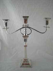 Appraisal: A three light silver candelabrum the tapered square column rising