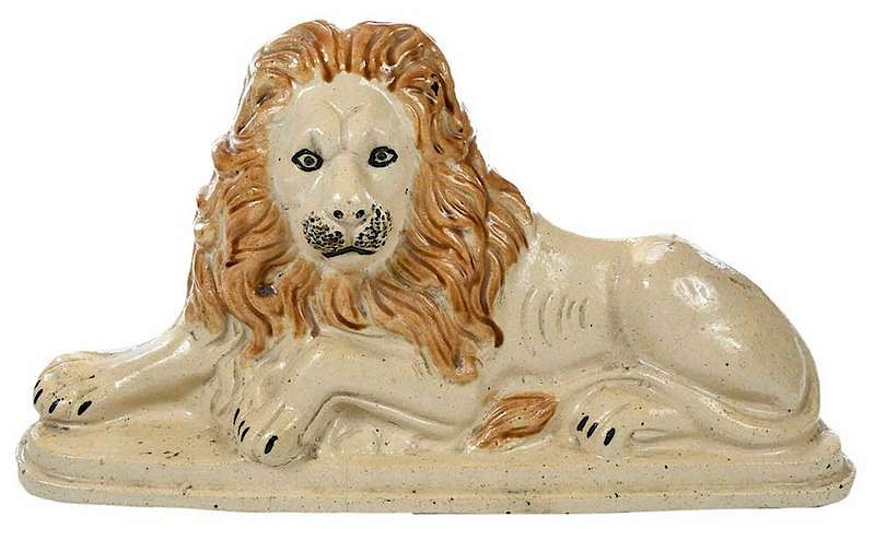 Appraisal: Large Ceramic Lion Doorstop th th century salt-glazed stoneware piece