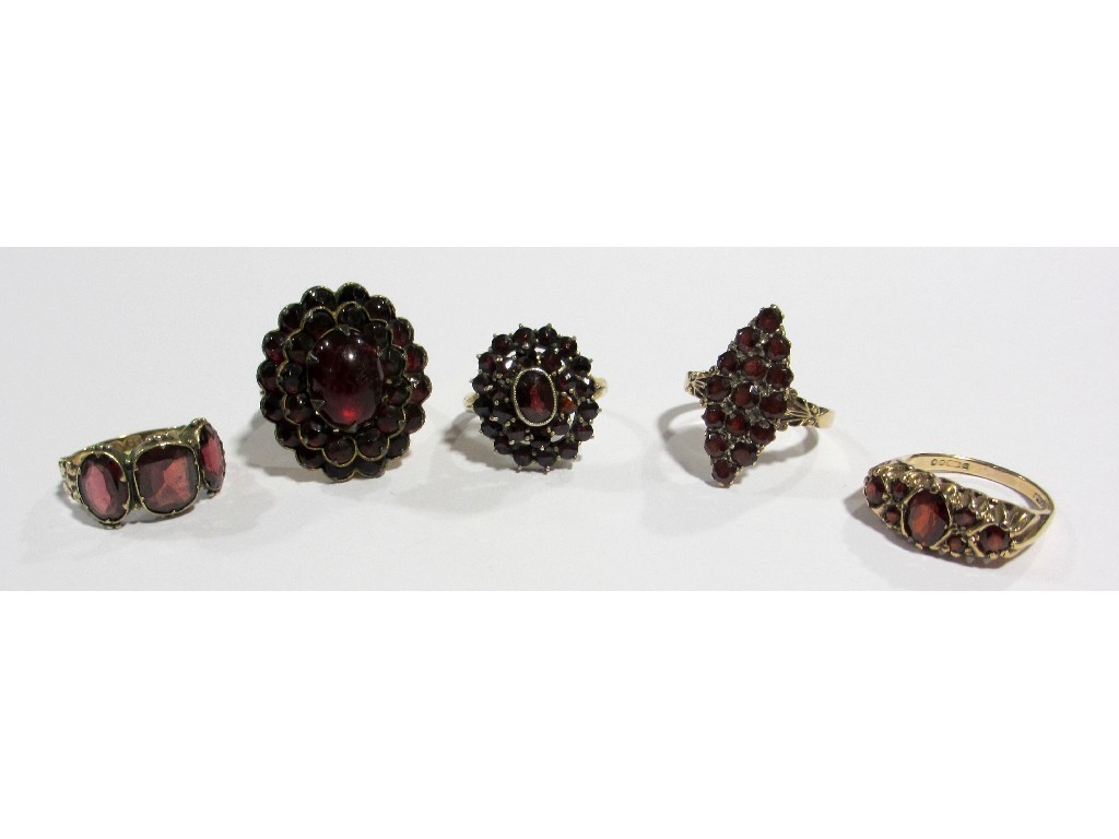 Appraisal: A marquise shaped garnet cluster ring set in ct gold