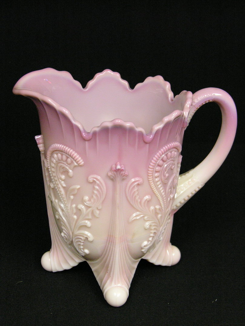 Appraisal: DUGAN PINK SLAG GLASS INVERTED FAN AND FEATHER PITCHER Developed