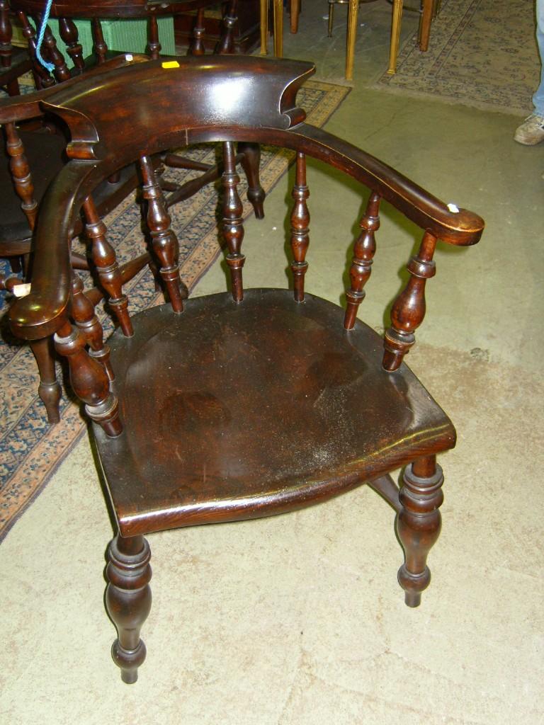 Appraisal: A set of old Windsor smokers bow elbow chairs with