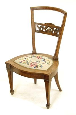 Appraisal: A th century Italian walnut side chair the pierced rail