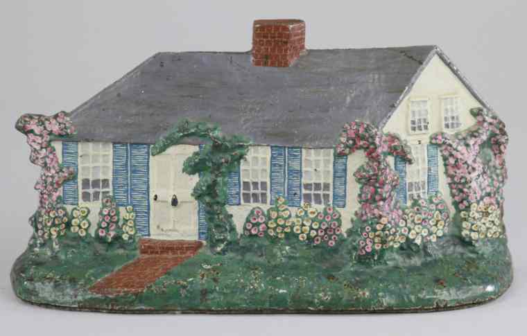 Appraisal: CAPE COD COTTAGE W HOLLYHOCKS DOORSTOP Quaint white cottage w