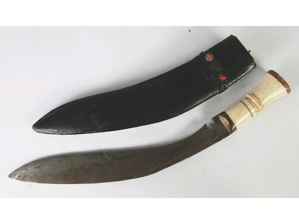 Appraisal: EARLY TWENTIETH CENTURY GURKA KUKRI with bone handle and leather