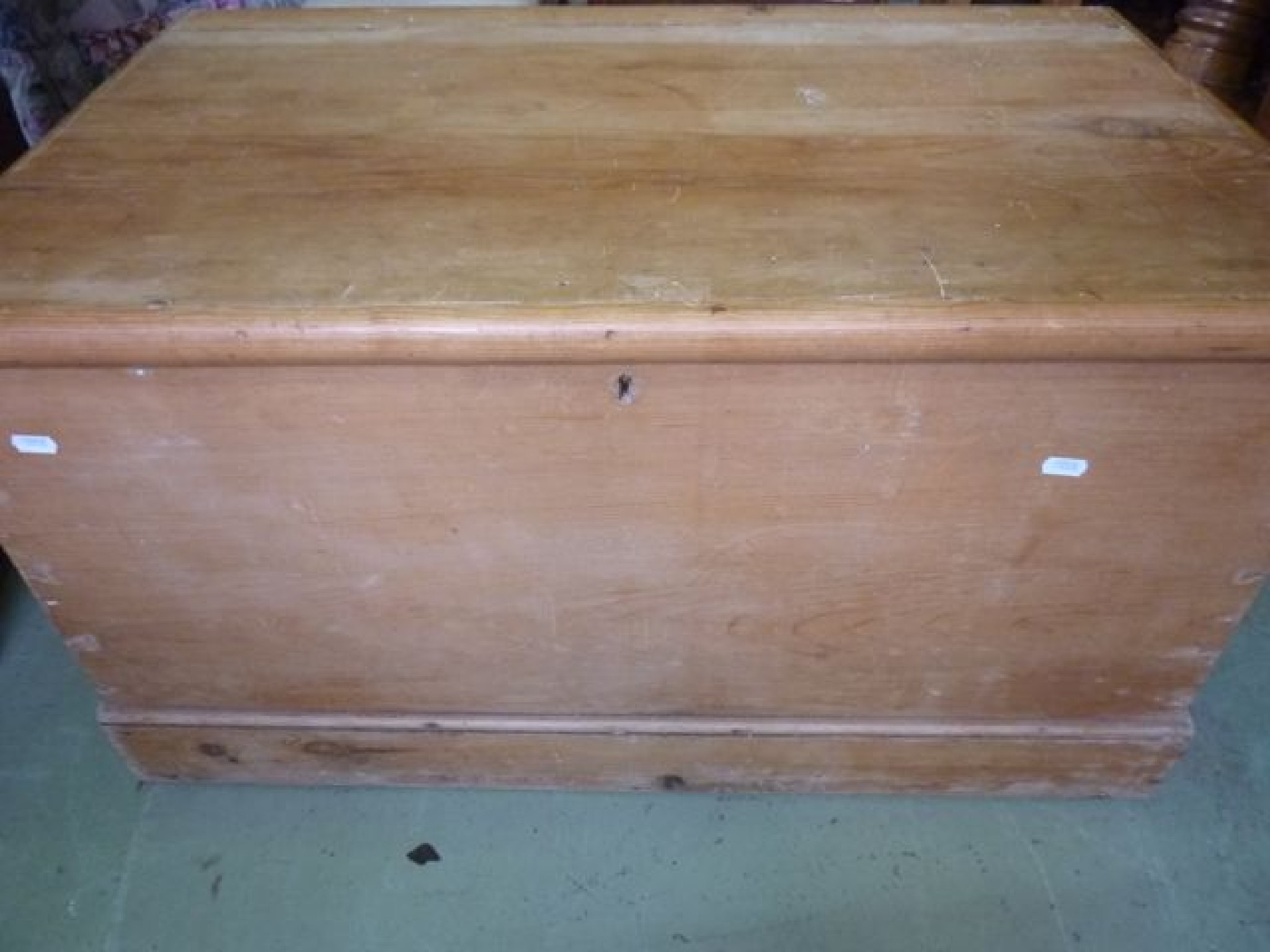 Appraisal: A Victorian stripped pine blanket box with hinged lid and