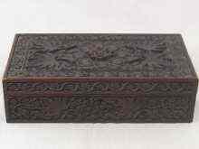 Appraisal: A large heavily carved wooden cigar box internally dated x