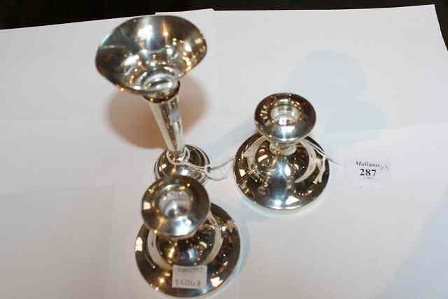 Appraisal: A PAIR OF SILVER DWARF CANDLESTICKS of turned form high