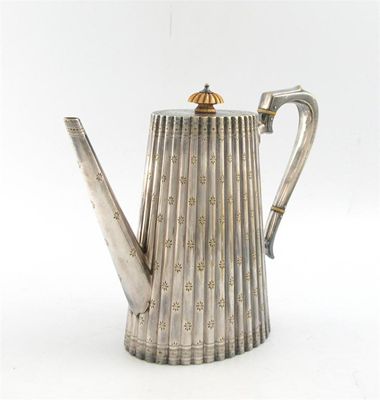 Appraisal: An electroplated coffee pot no maker's mark of tapering reeded