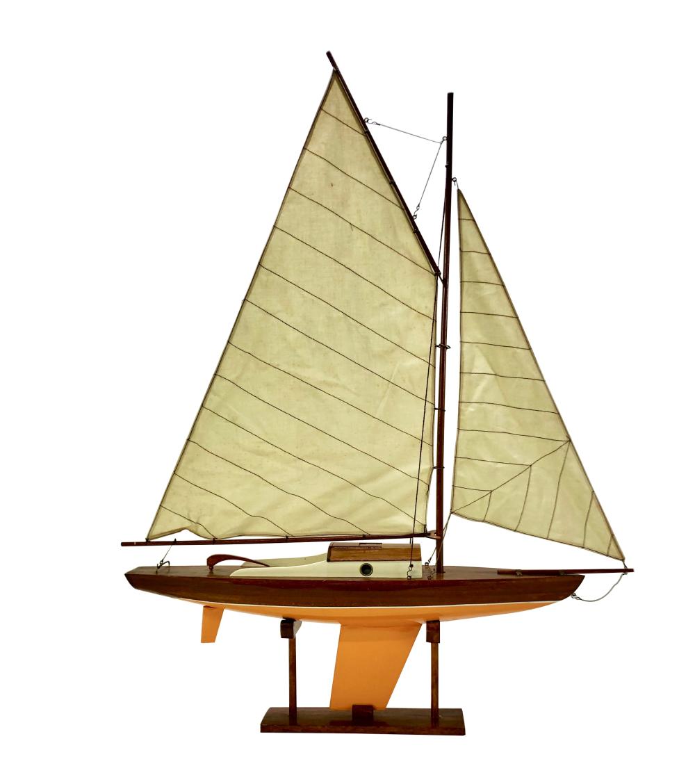 Appraisal: YELLOW-PAINTED WOOD MODEL OF A SAILBOATon wood stand with a