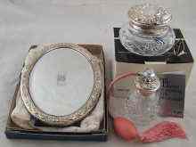 Appraisal: Silver A mirror with strut back x cm a silver