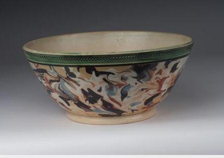 Appraisal: BRITISH CREAMWARE MOCHAWARE HEMISPHERICAL BOWL CIRCA Slip-marbled in dark brown