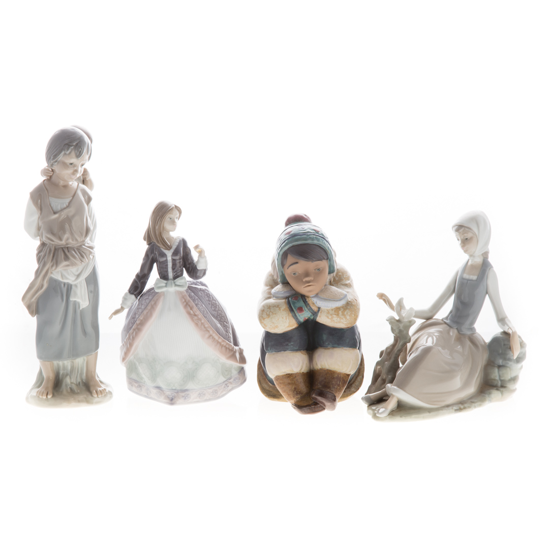 Appraisal: Four Lladro porcelain figures Including Angela in H Pensive Eskimo