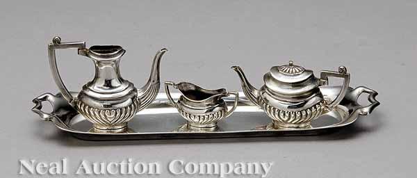 Appraisal: A George V Sterling Silver Doll's Tea Set AM Co