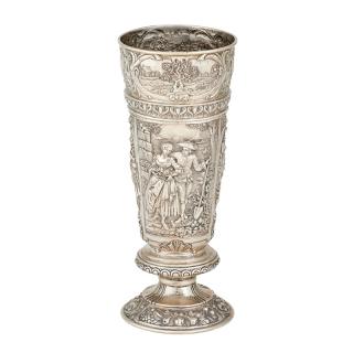 Appraisal: CONTINENTAL SILVER VASE Decorated with farming and harvest motif and