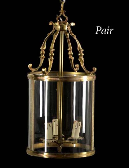 Appraisal: Pair of French Cast-Brass and Convex Glass Cylindrical Hall Lanterns