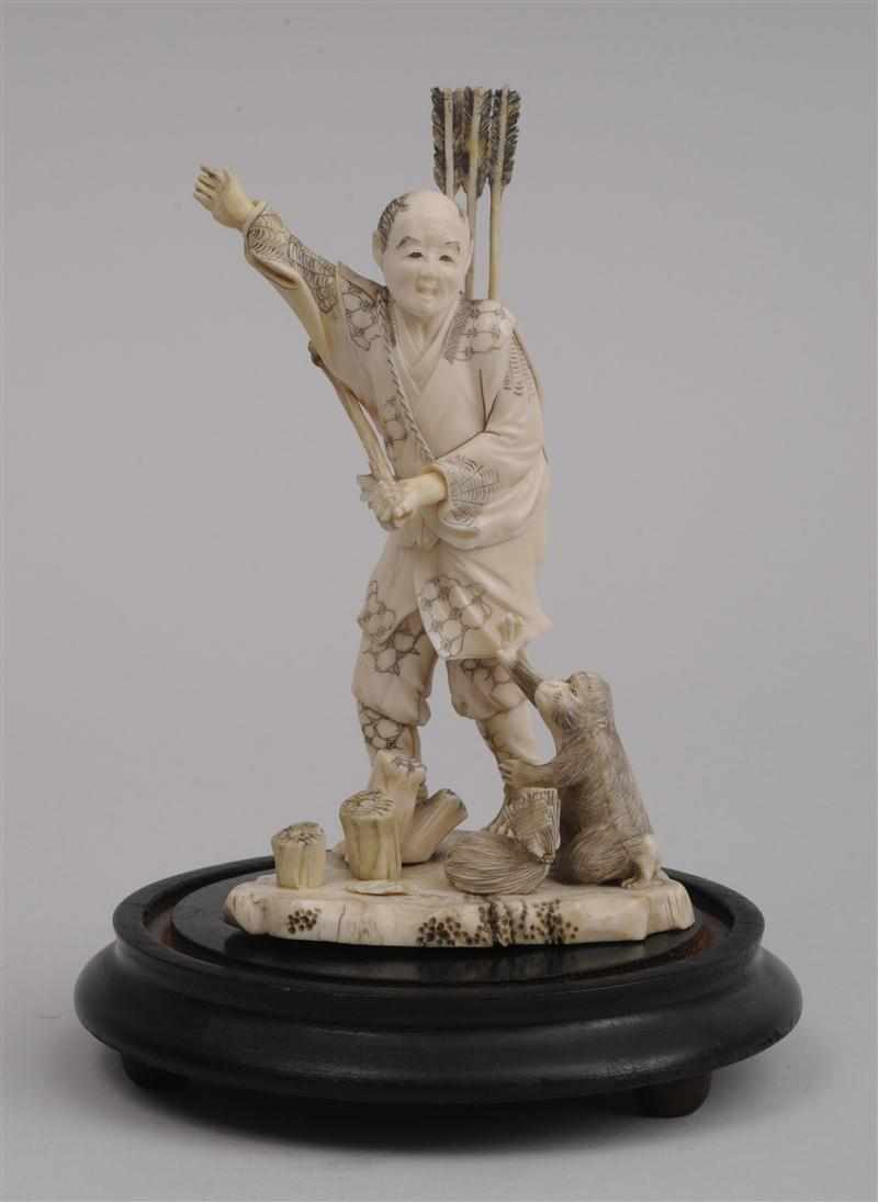 Appraisal: JAPANESE CARVED IVORY OKIMONO Depicting a barefoot peasant with sheaf