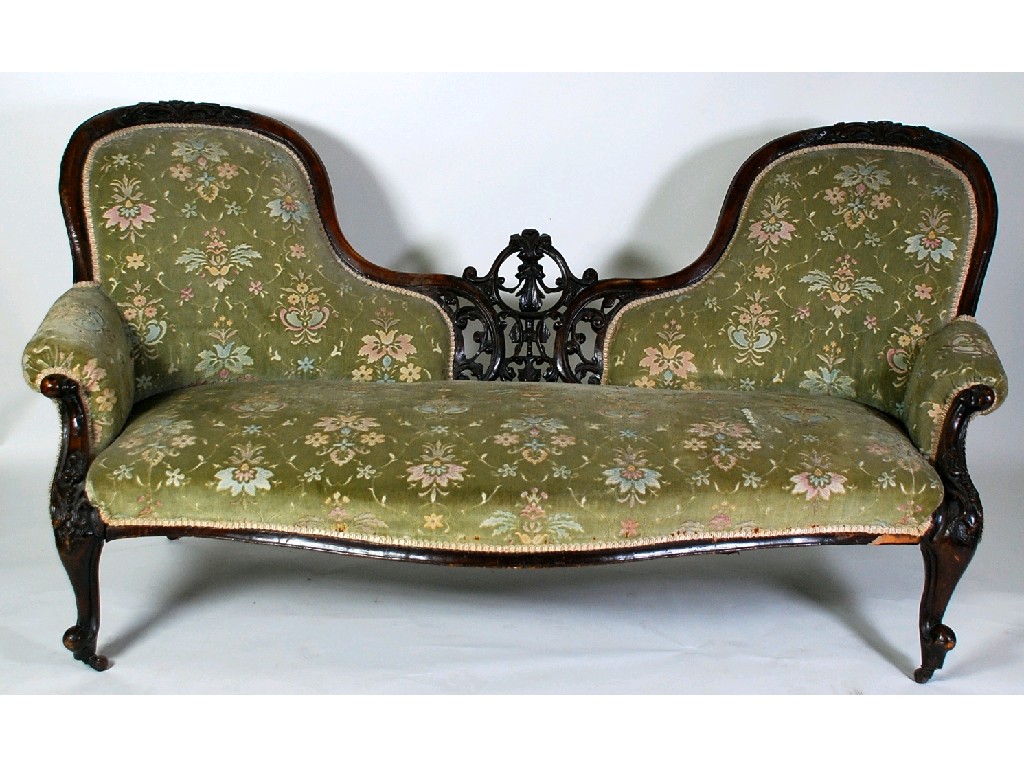 Appraisal: VICTORIAN CARVED WALNUTWOOD DOUBLE ENDED SOFA the floral carved show