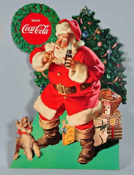 Appraisal: s Die-Cut Cardboard Coca-Cola Santa Display Description Very clean and